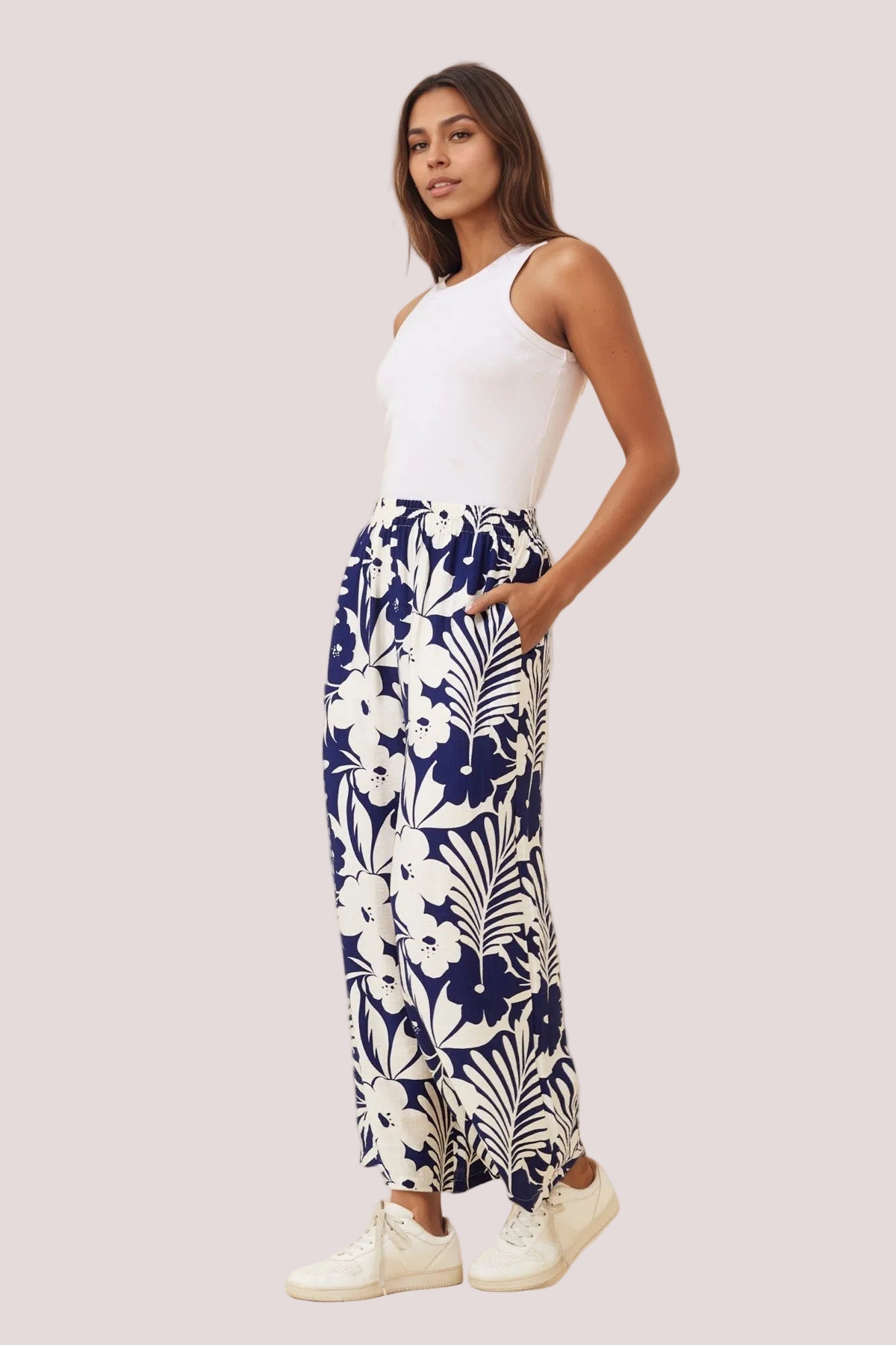 Woman wearing a blue navy pants with side pockets