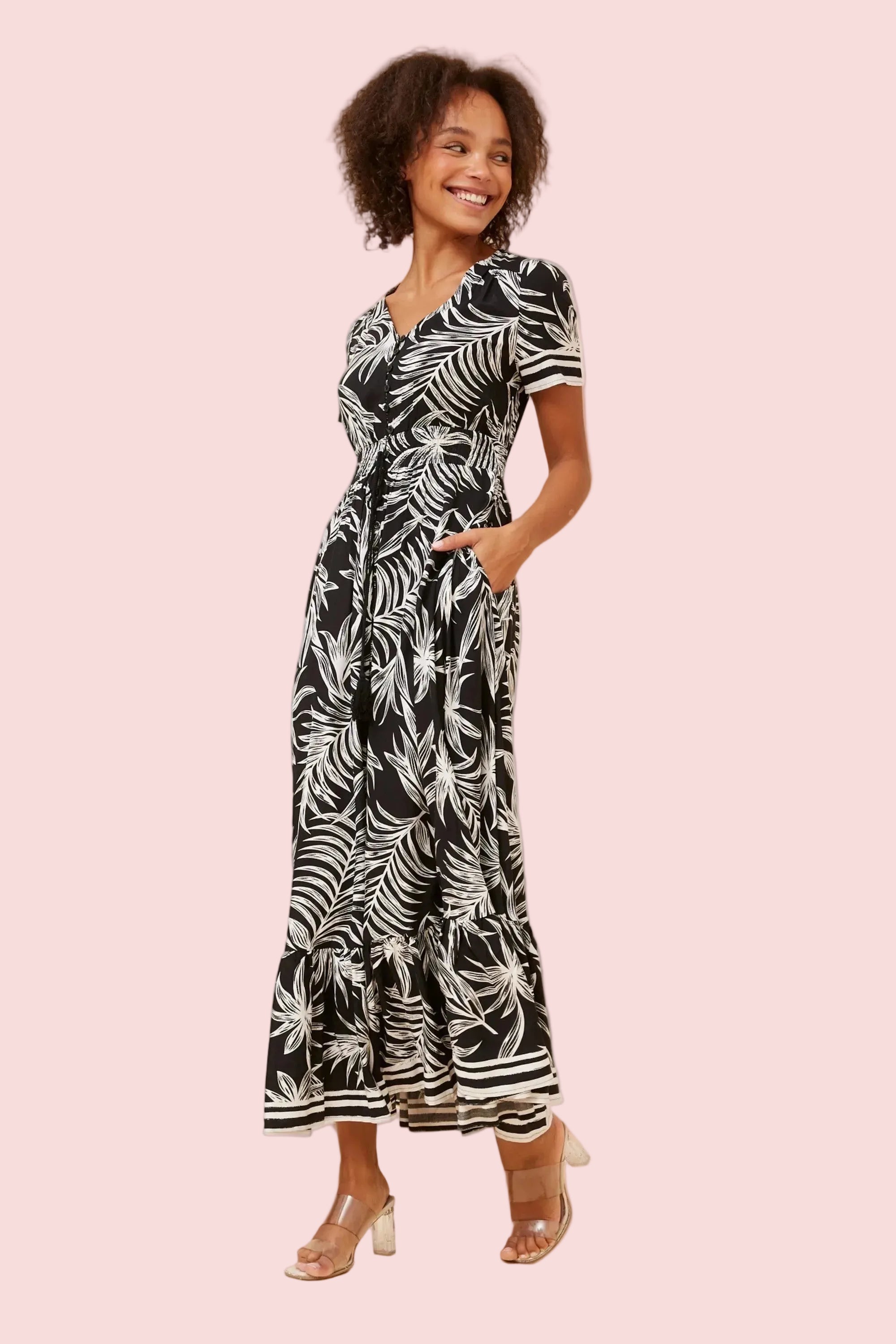 Woman wearing a black and white maxi dress 